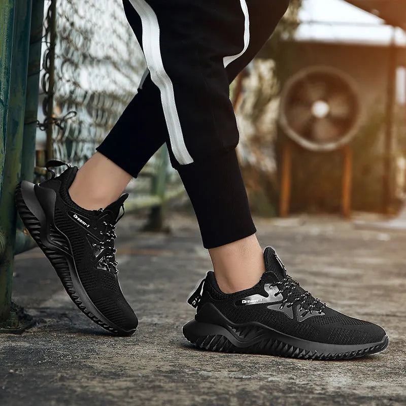 Men's low-top running shoes in multiple colours with mesh upper and front strap.