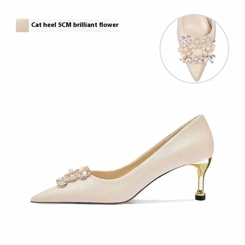 Pointed-toe crystal bridal high heel shoe with rhinestones on a cloth upper, shown with a cat heel and a stiletto heel option.