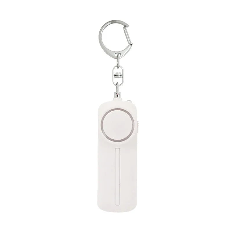 Compact pink personal safety alarm with keyring, shown at 86mm long.