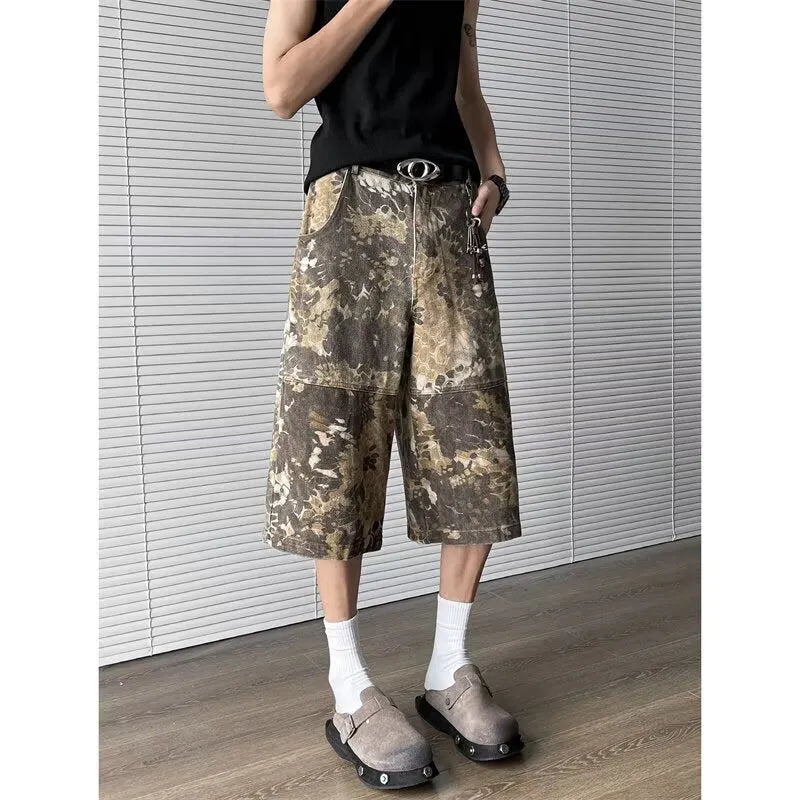 Yellow snake pattern camouflage cropped jeans with cotton denim construction showing tooling detailing