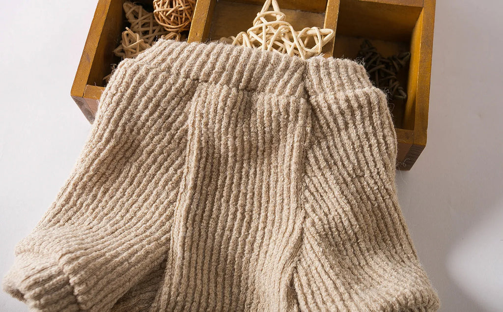 Brown knit pullover sweater on small dog showing casual style and fit