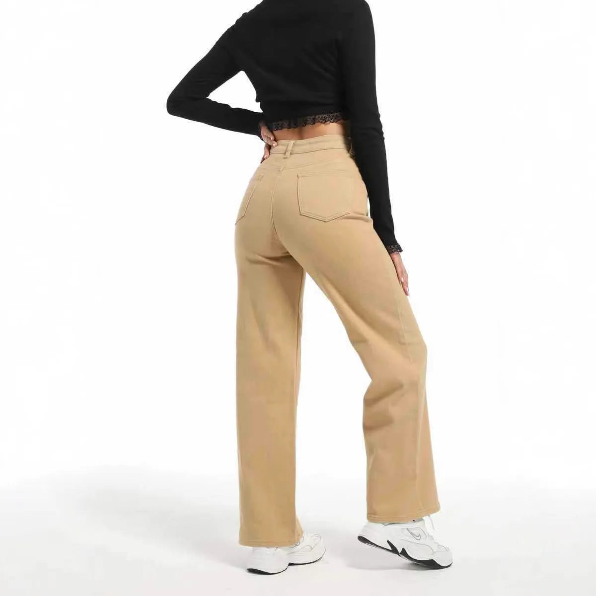 Women's high-waisted wide leg straight jeans in apricot and khaki colours on a model.