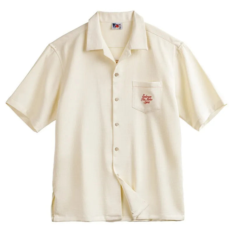 Light apricot men's Cuban collar shirt with bamboo plant pattern and short sleeves
