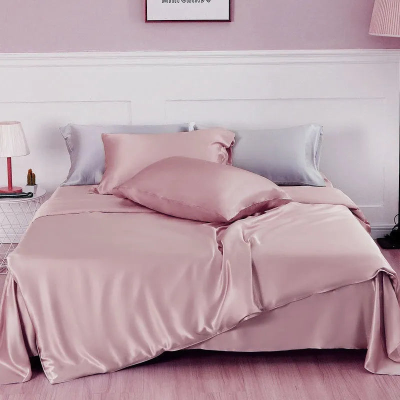 Double-sided silk duvet cover in a solid colour, shown in bright brown on a bed.