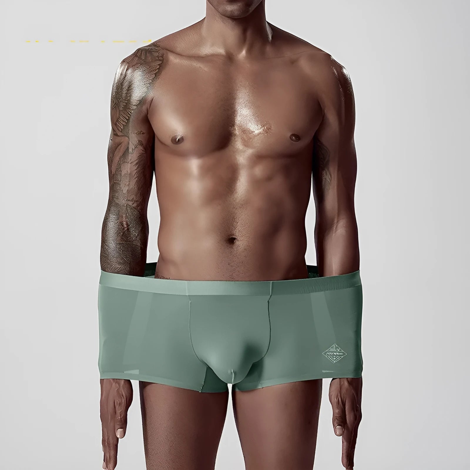 Men's seamless one-piece modal underwear in green on a mid-waist mannequin.