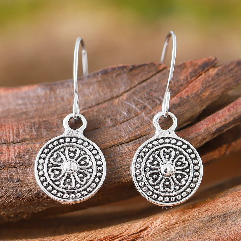 Bohemian style retro round print distressed ethnic earrings for women in zinc alloy with electroplated finish