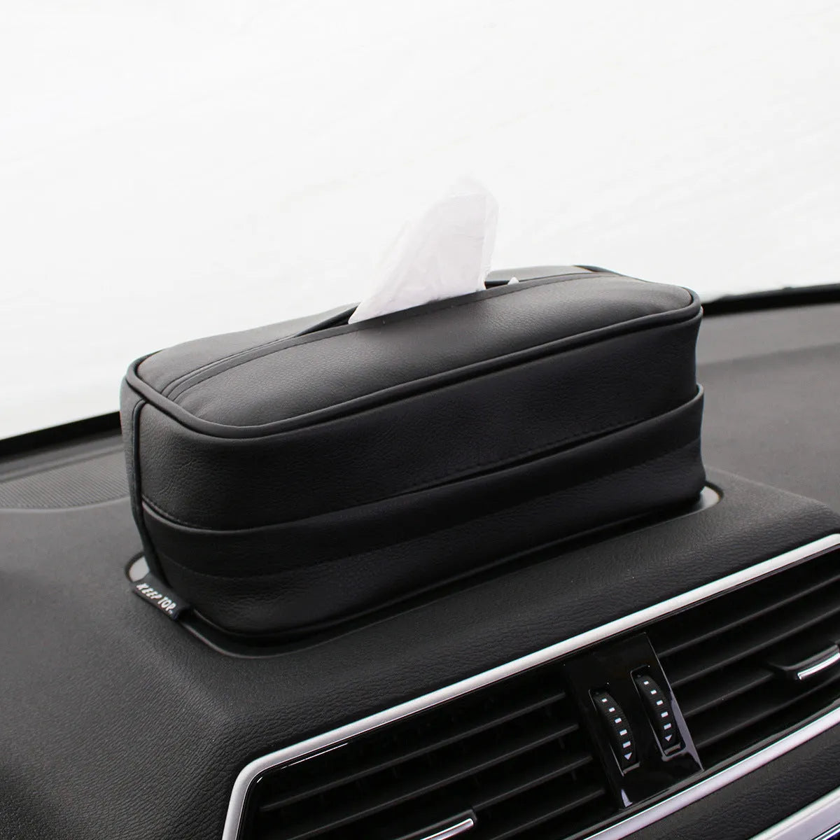 Black PU leather hanging storage bag with zip for car and home organisation