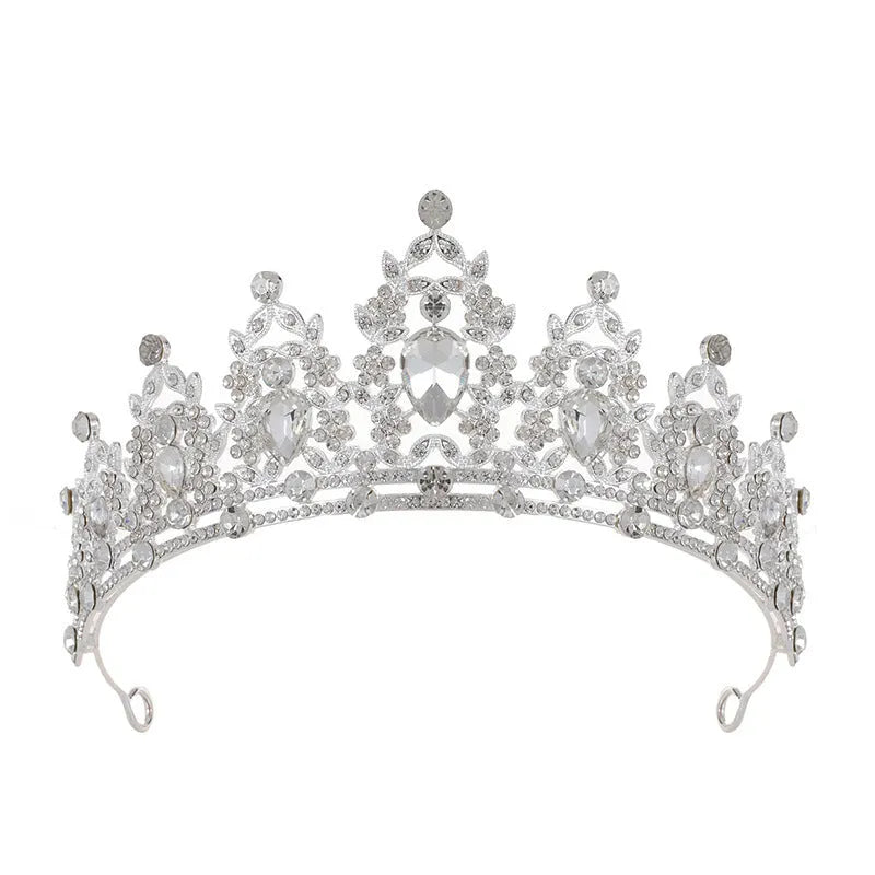Baroque-style bride crown headdress made of alloy with rhinestone decoration in silver and gold colour options.