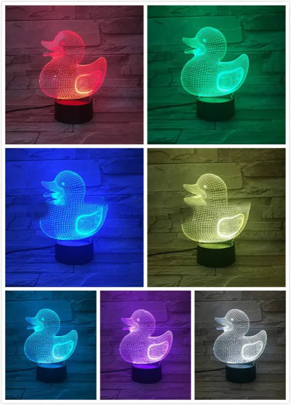 3D cartoon yellow duck LED night light on a table, showing multiple colour options with remote control.