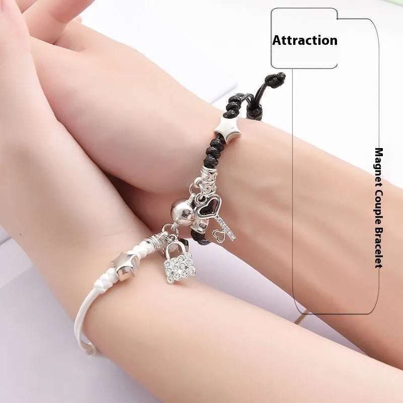 Magnetic couple suction bracelets pair with alloy electroplated finish showing various symbolic designs