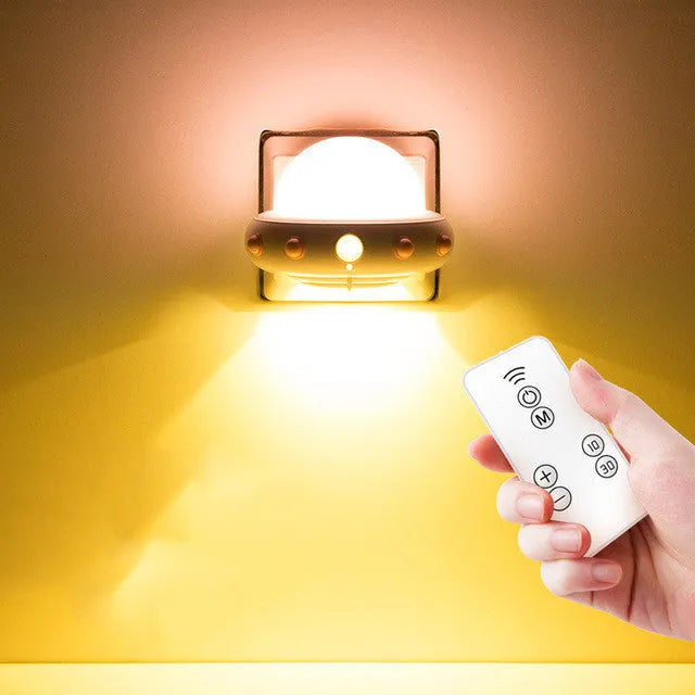 Remote control UFO shaped bedside night light in white, blue or pink colours