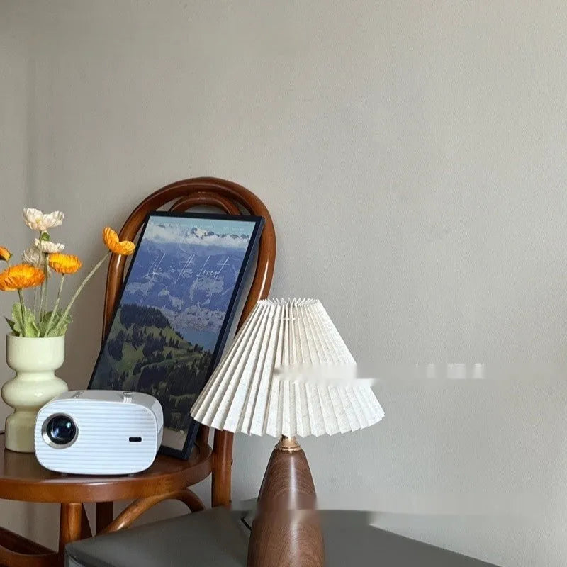 Nordic retro ceramic table lamp with pleated shade on bedside table, remote control included