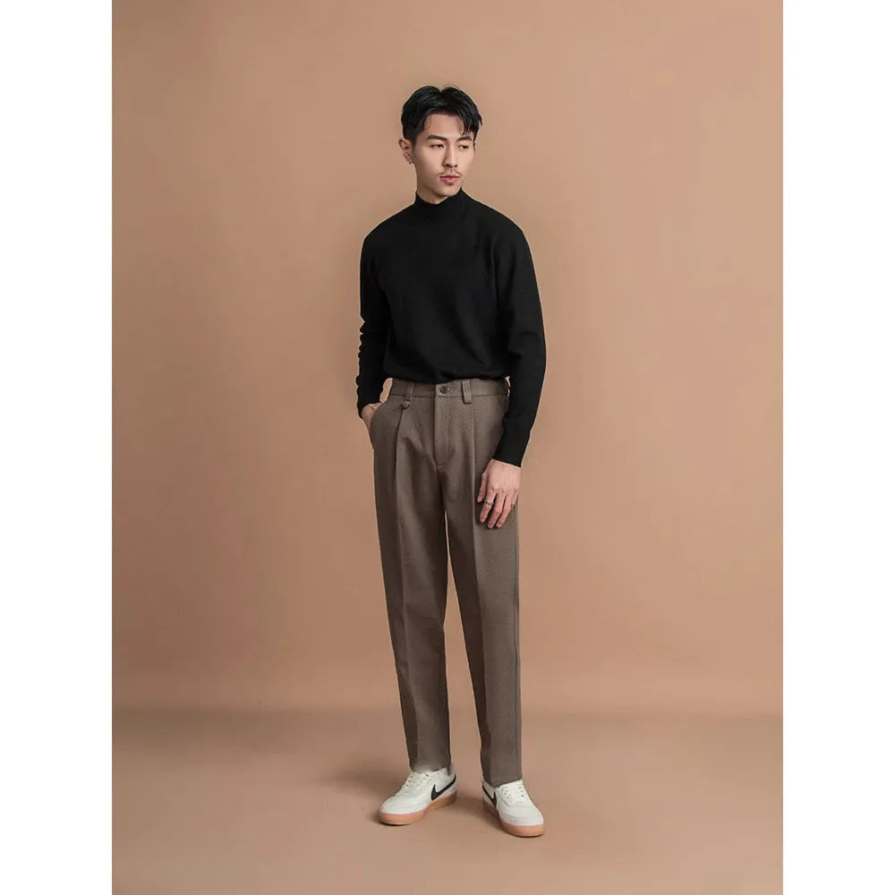 Men's straight leg trousers in dark grey with draped casual styling for winter business casual wear