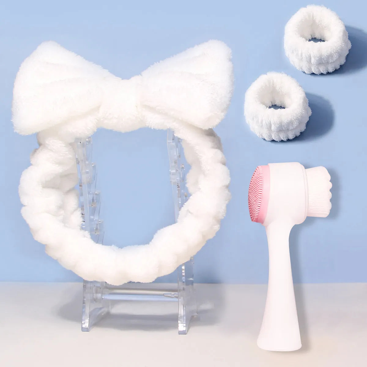 Facial brush set with coral fleece hair band and plastic handle in multiple colour options