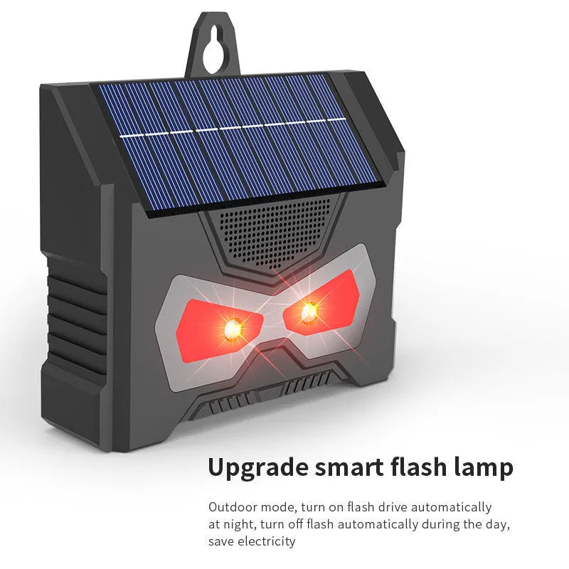 Black solar powered ultrasonic animal repeller outdoor device with flashing LED lights for garden pest control
