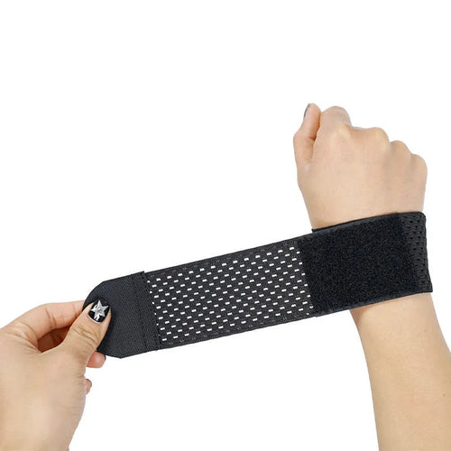 A black elastic breathable wrist guard for athletic support during gym workouts.