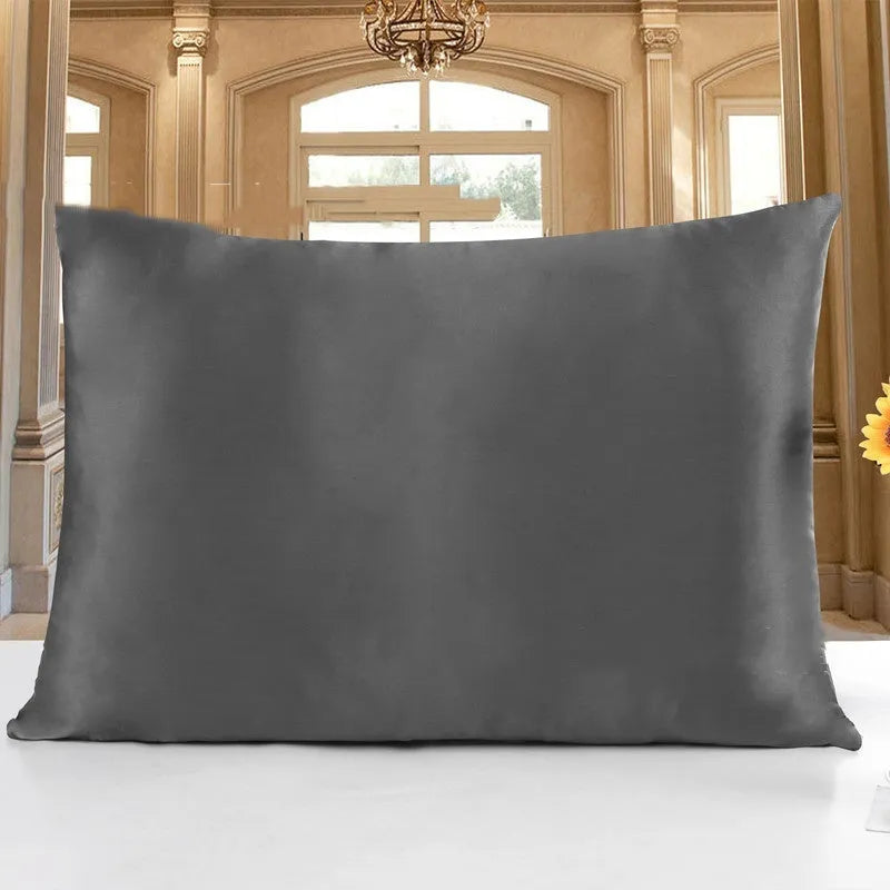 Double-sided 19 M silk pillowcase in apricot colour, showing smooth satin weave texture.