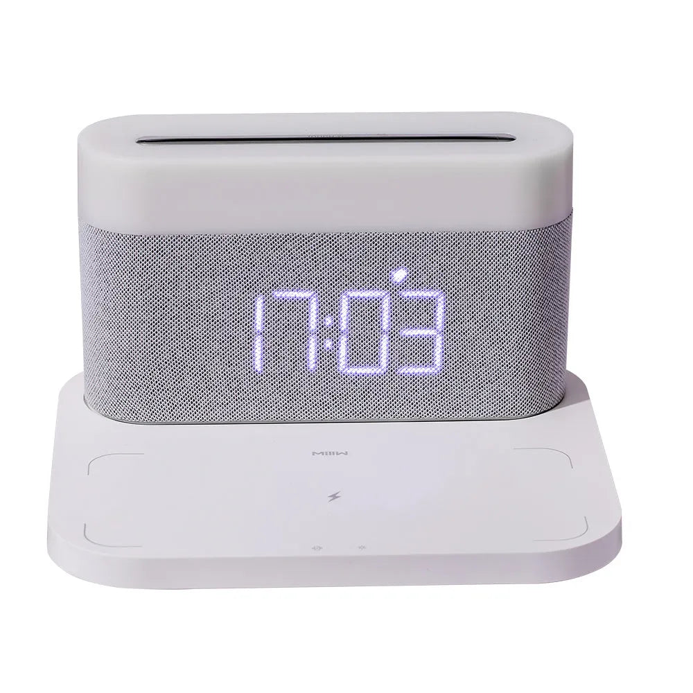 Modern minimalist wireless charging desktop clock with night light and table lamp functions