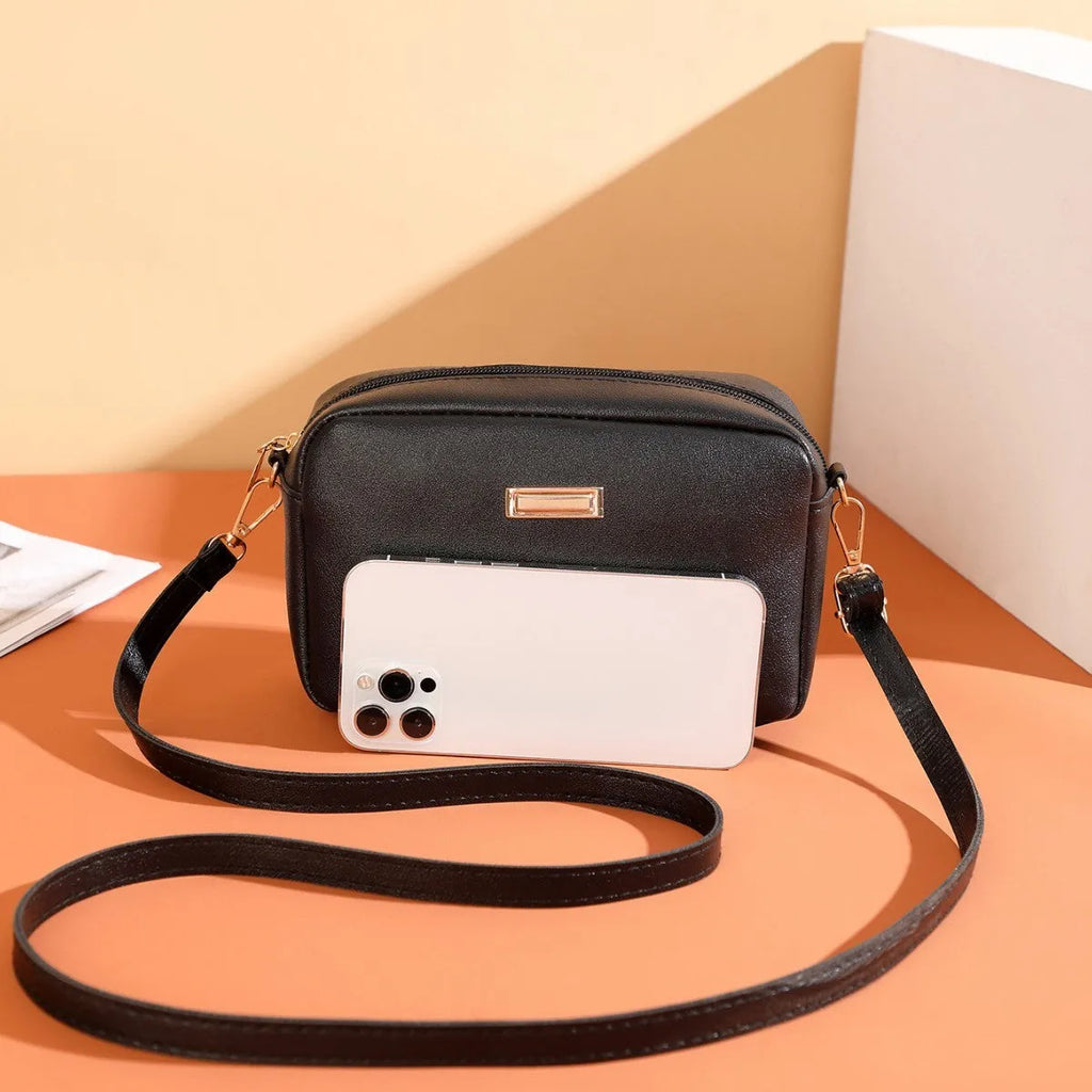 Women's solid colour PU shoulder bag with three-dimensional pockets in horizontal square shape