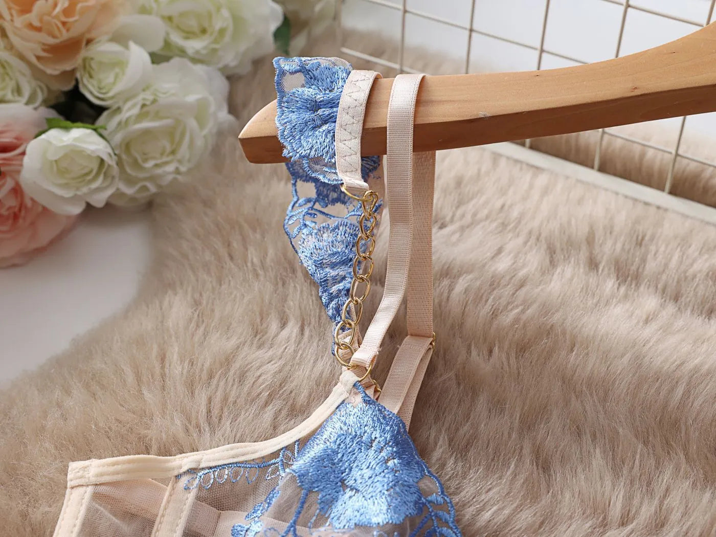 Light blue embroidered lace bra and panty set with transparent mesh design