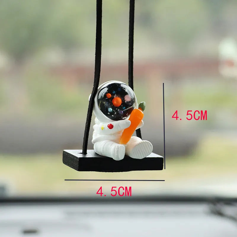 Cartoon astronaut resin pendant for car decoration, shown in various colour and style options.