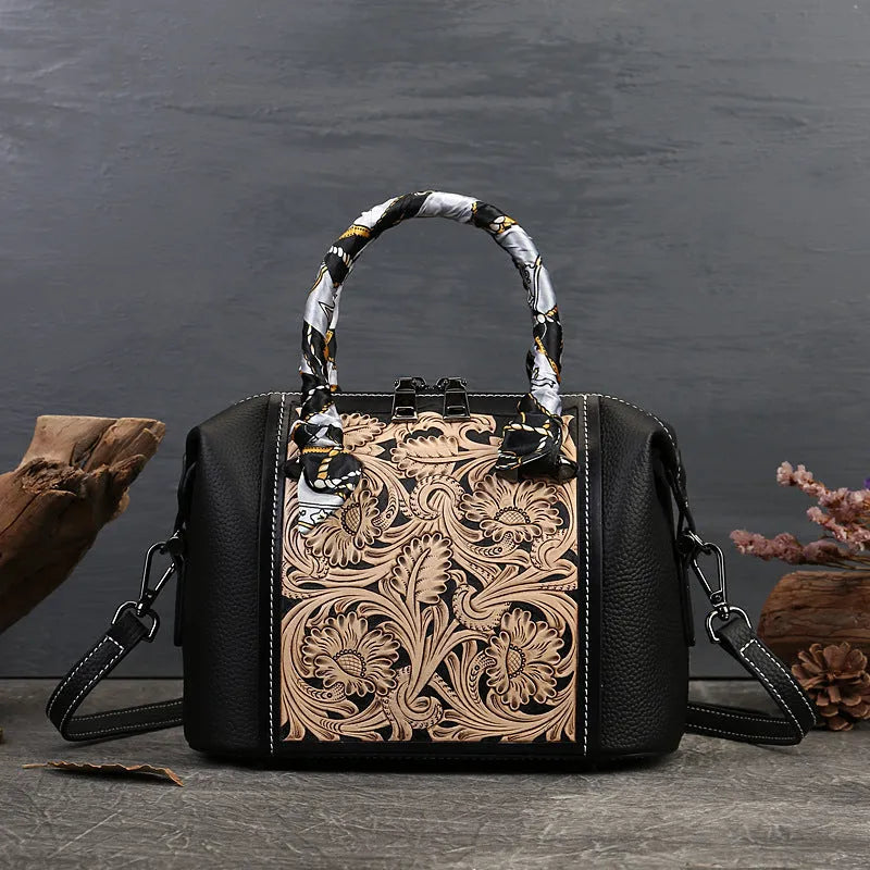 Vintage style genuine leather messenger bag in black with horizontal square shape and front pocket.