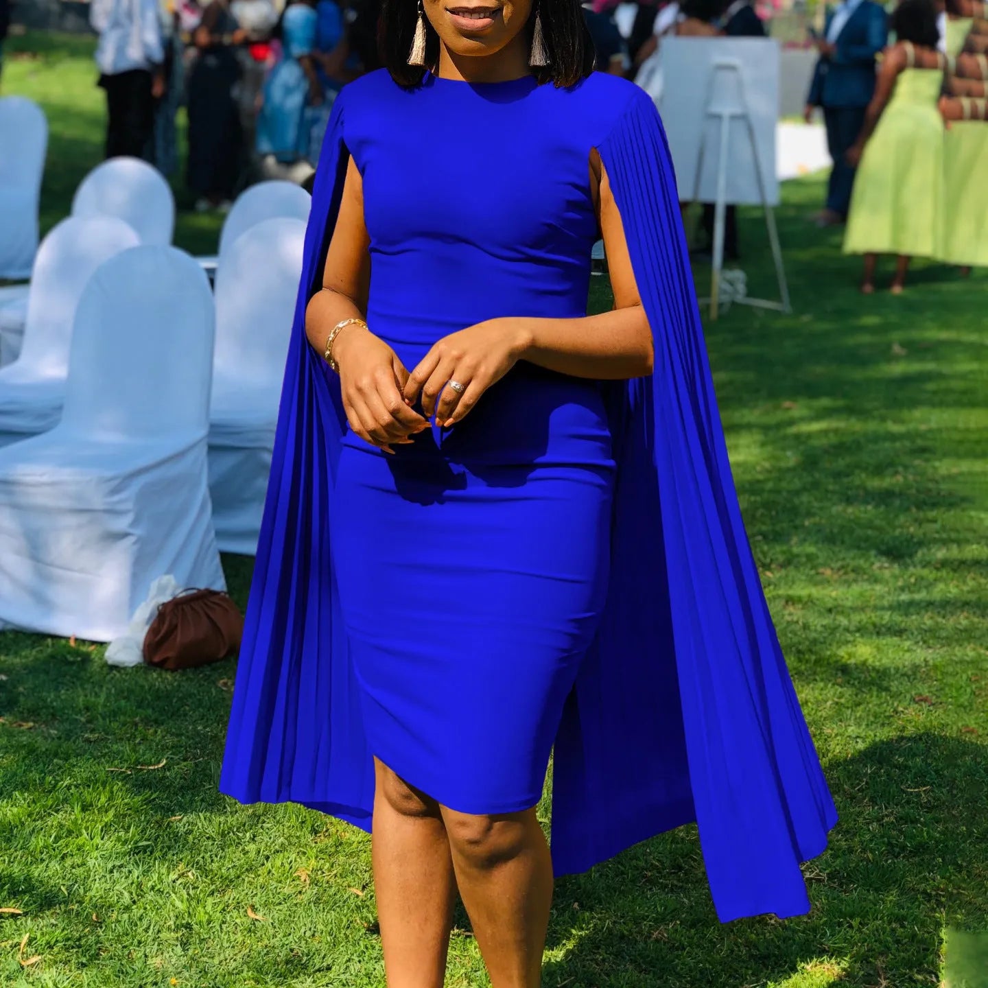 Women's long sleeve evening dress with pleated shawl collar in a choice of colours.
