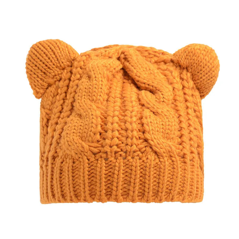 Hand knitted wool cat ear beanie in red colour for winter wear