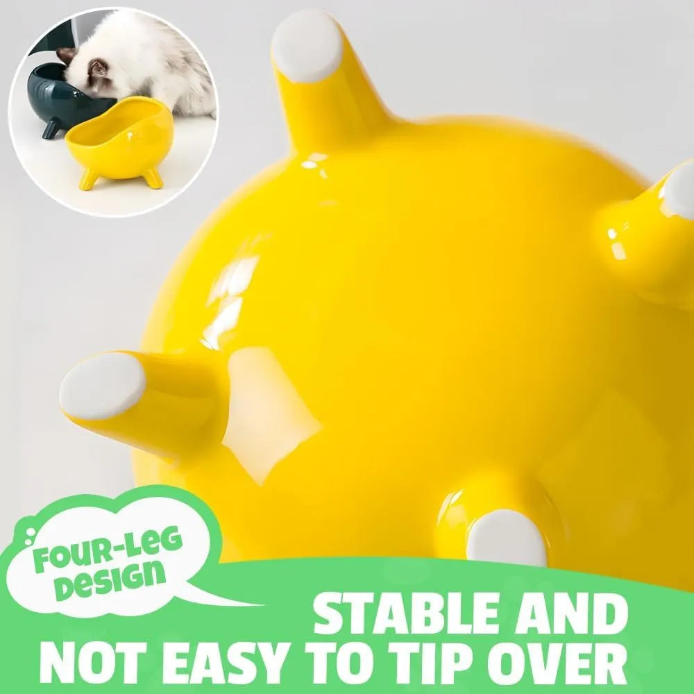 Green four-legged ceramic pet bowl for cats and small dogs on floor