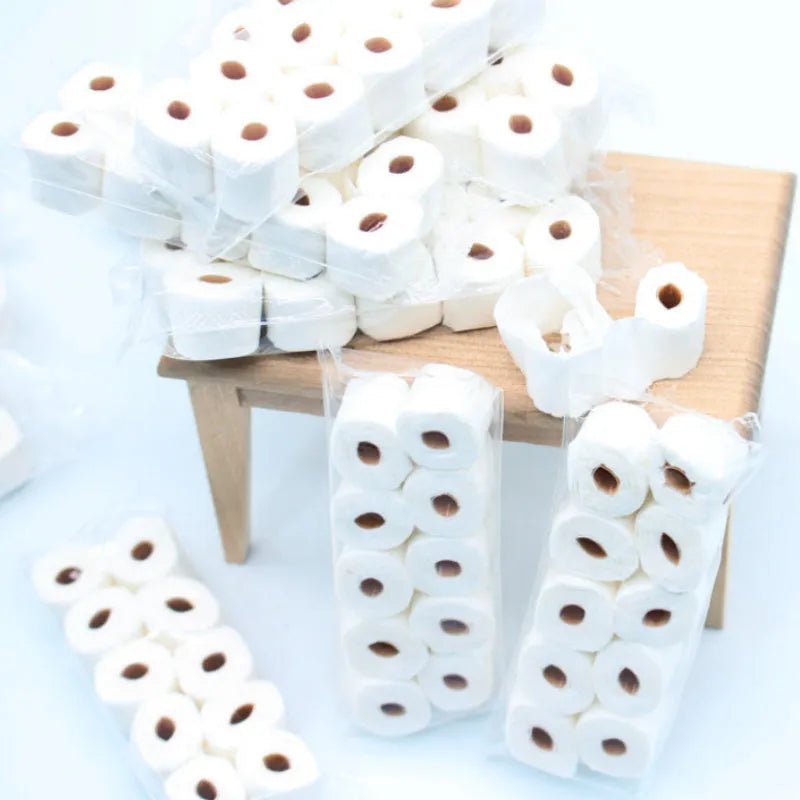 Paper simulated tissue roll model measuring 30mm wide 15mm deep 80mm tall