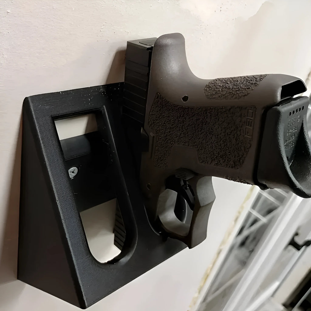 Black plastic pistol stand with punk-style design for displaying firearms