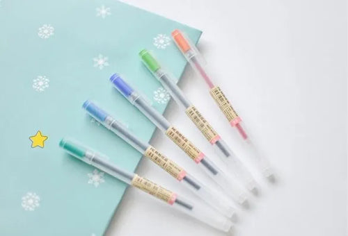 Muji 12 Piece 0.5mm fine nib gel pen set with aqueous ink shown in packaging.
