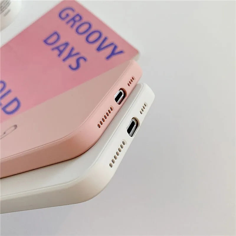 Silicone TPU phone case for Apple iPhone in solid colour options: black, green, grey, light green, pink, purple, red, white.