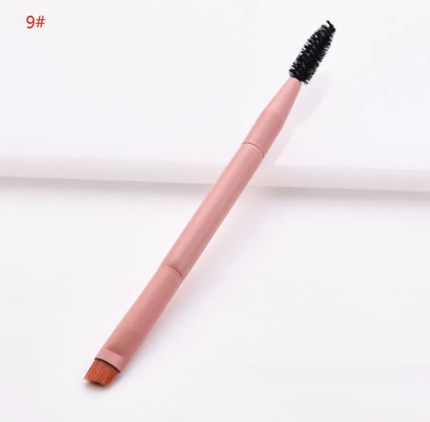 Open case showing 10 pink-handled makeup brushes including loose powder, foundation, flat head, and double-ended brushes.
