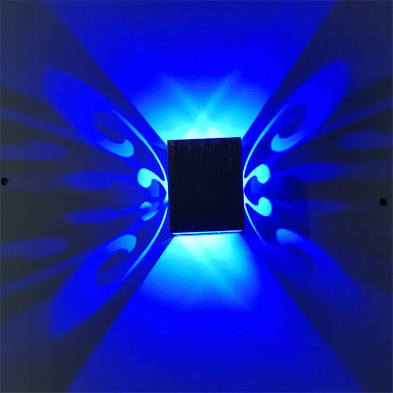 Butterfly-shaped LED wall lamp with aluminium shade and remote control for colour selection