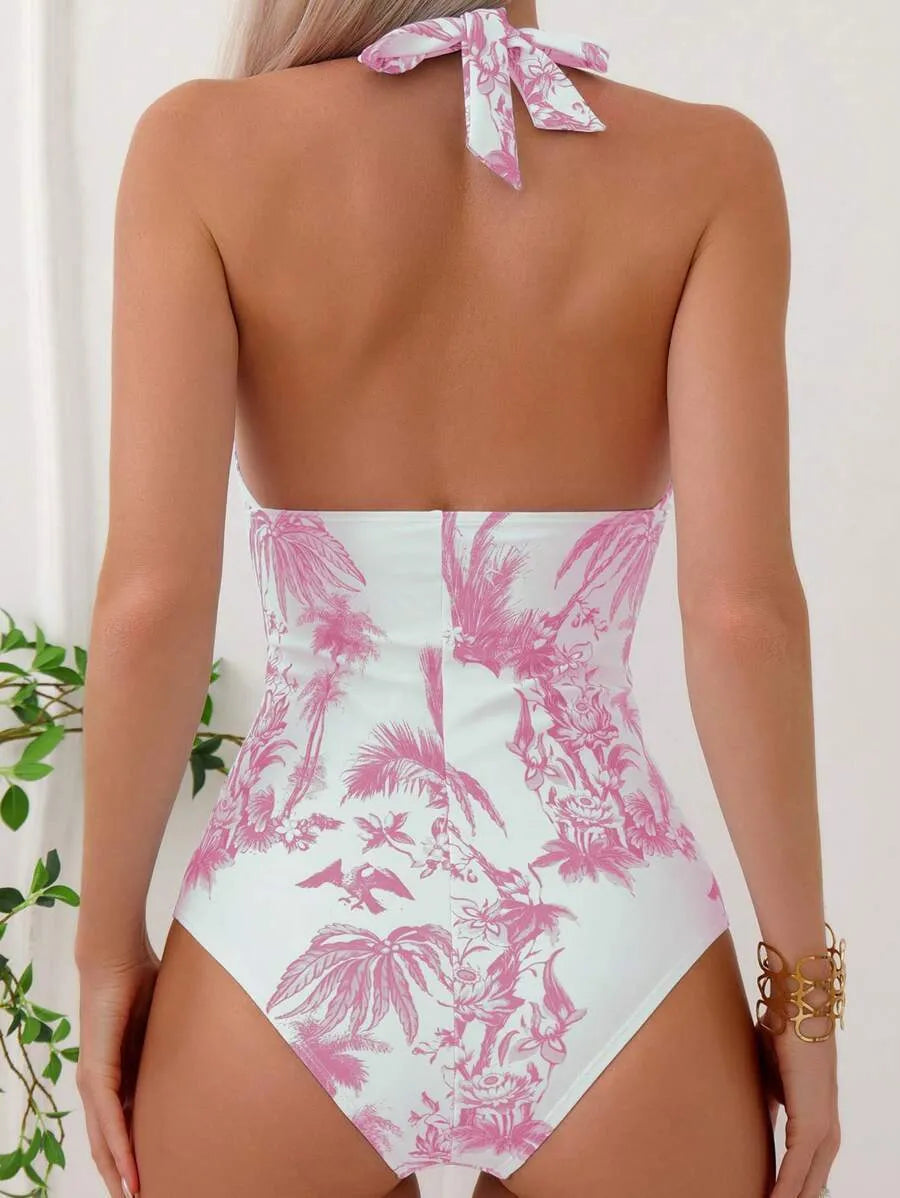 Women's printed V-neck one-piece swimsuit in apricot colour on a mannequin.