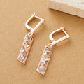 Rectangular hollow stud earrings with a two-tone colour geometric design