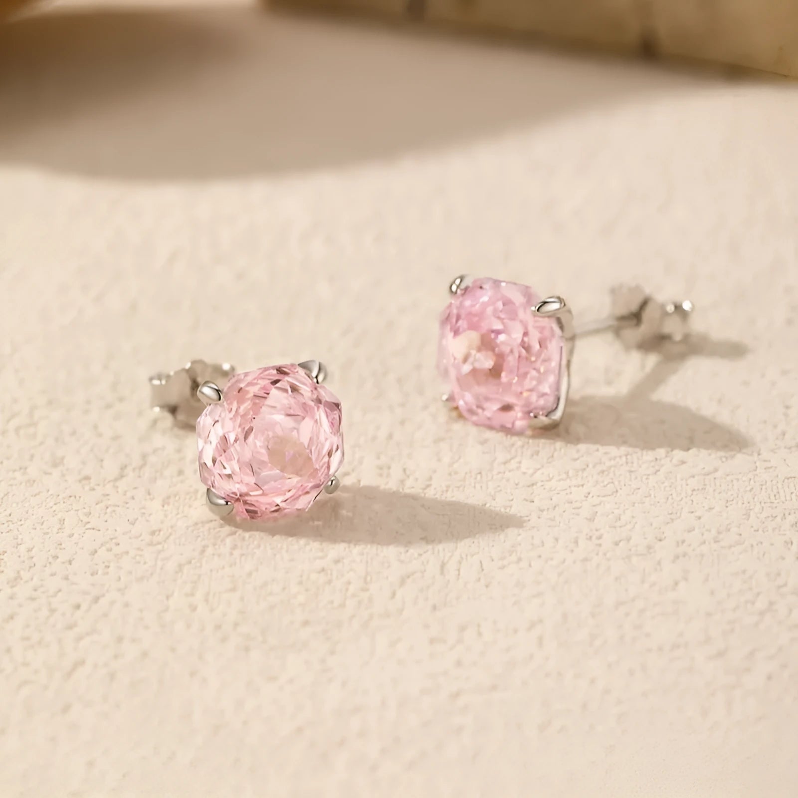 S925 sterling silver rose stud earrings with pink crystal accents in 6mm and 8mm sizes
