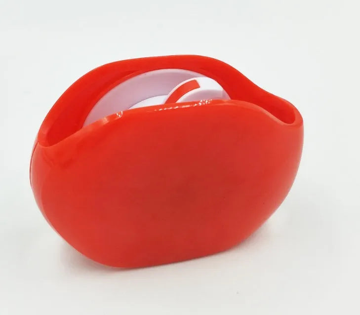 Automatic earphone cable retractor winder in a compact plastic storage box.