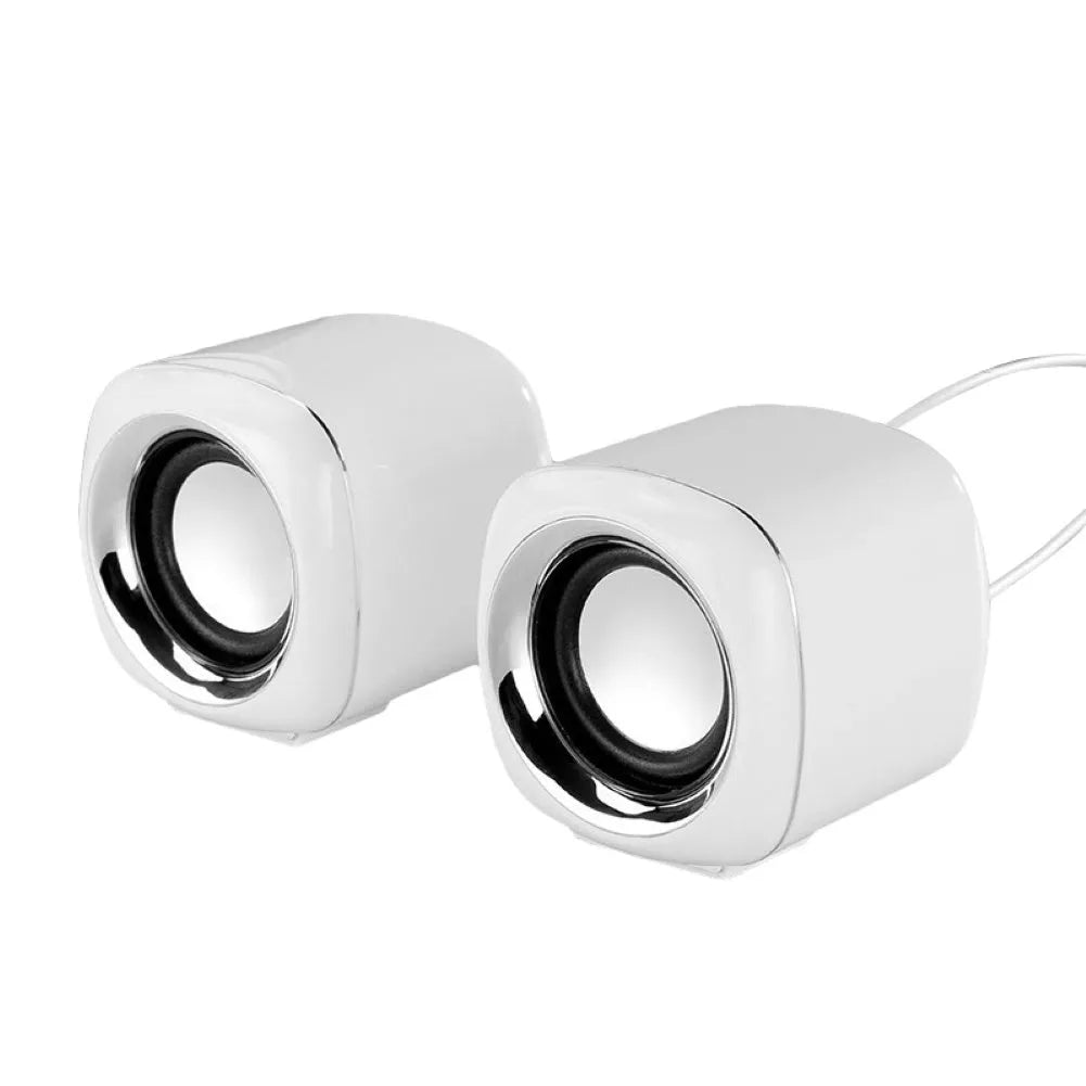 Compact black desktop speakers with 3.5mm cable and volume scroll wheel
