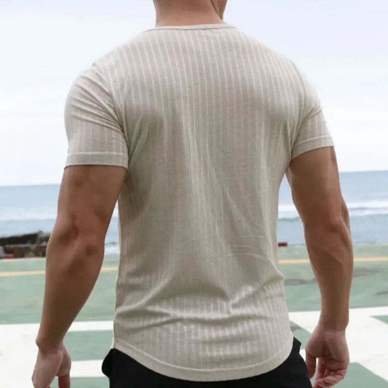 Men's white solid colour loose fit short sleeve cotton blend pullover t-shirt on model