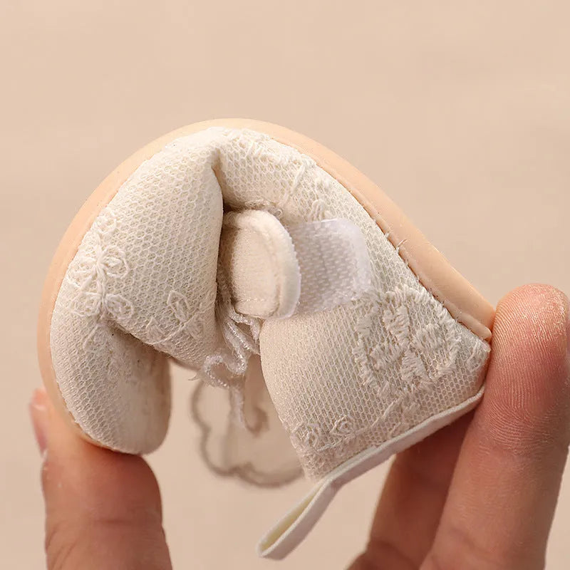 Spring baby toddler walking shoes with mesh upper, lace bow, and non-slip sole in solid colour