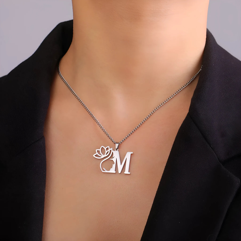 Stainless steel cross chain necklace with a pendant, available in gold or silver electroplated finish.