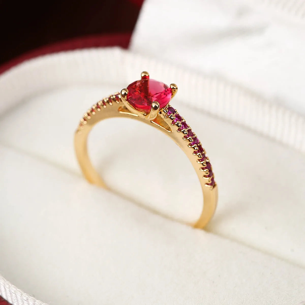 Hexagonal geometric zircon ring in copper with electroplated finish showing angular design and zircon stone