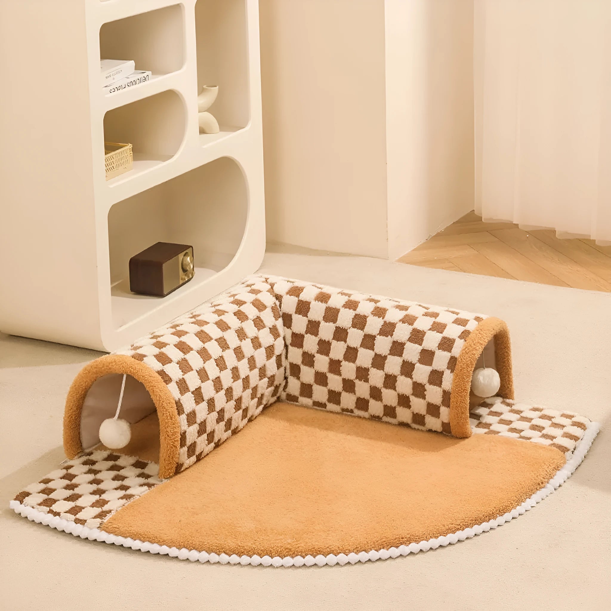 Fan-shaped plush pet bed with integrated tunnel for cats and dogs in coffee colour.