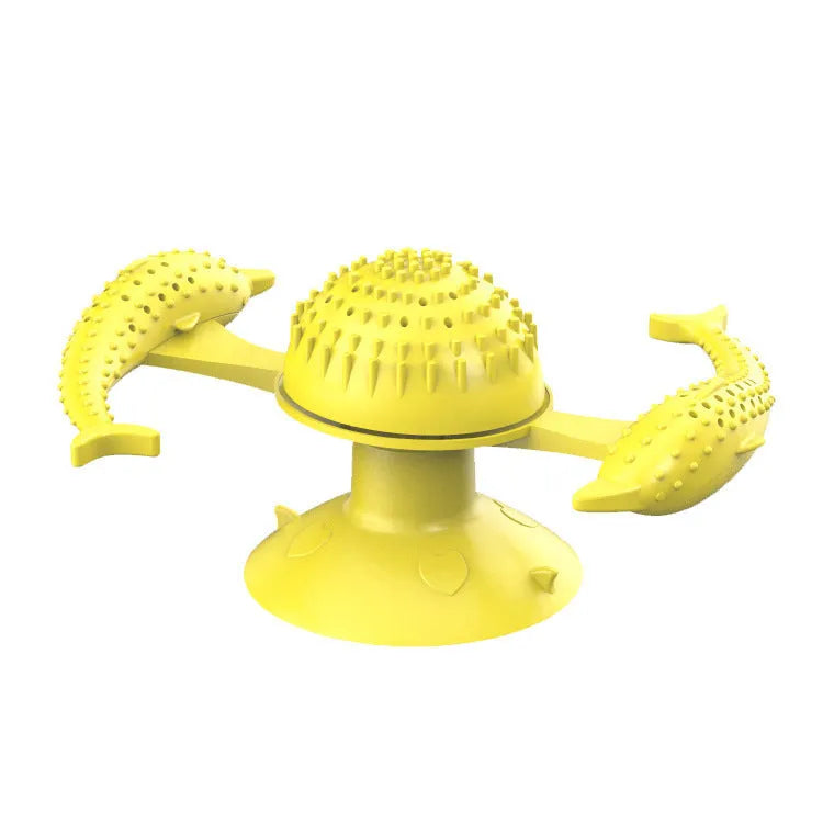 Blue rubber turning windmill cat toy on floor, designed for interactive boredom relief play