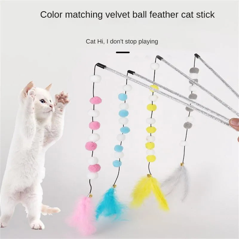 Colourful cat teaser stick with acrylic pompons and feather attachments measuring 31cm long