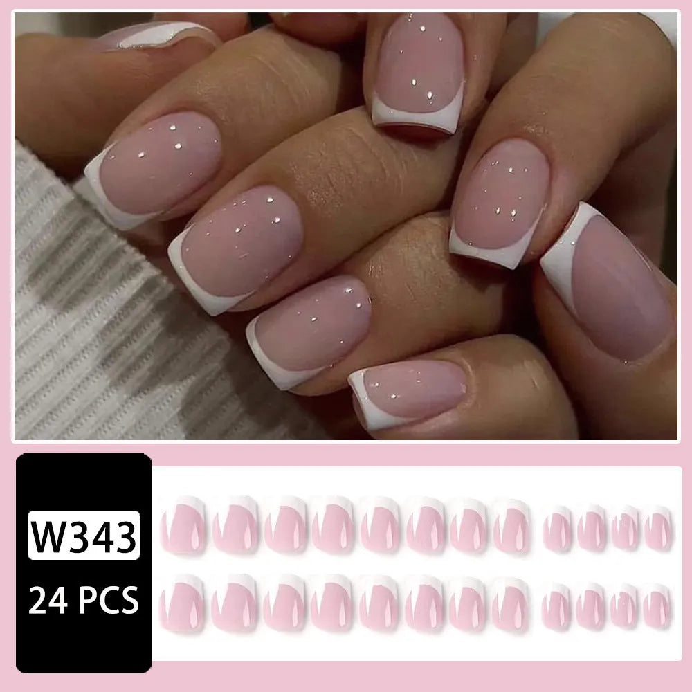 24 white fake nails with plaid patterns arranged as nail tips