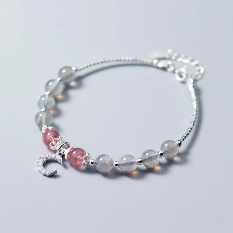 Adjustable moonstone bracelet with crescent moon charm and crystal on extension chain