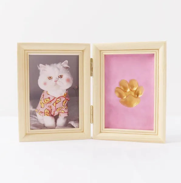 Solid wood cat palm print photo frame with gold lacquer and seal paste kit on table